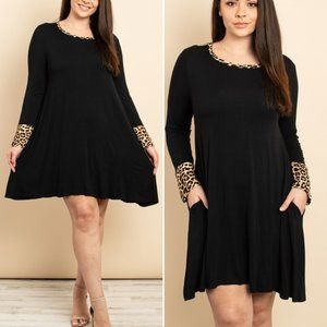 Leopard trim & black dress